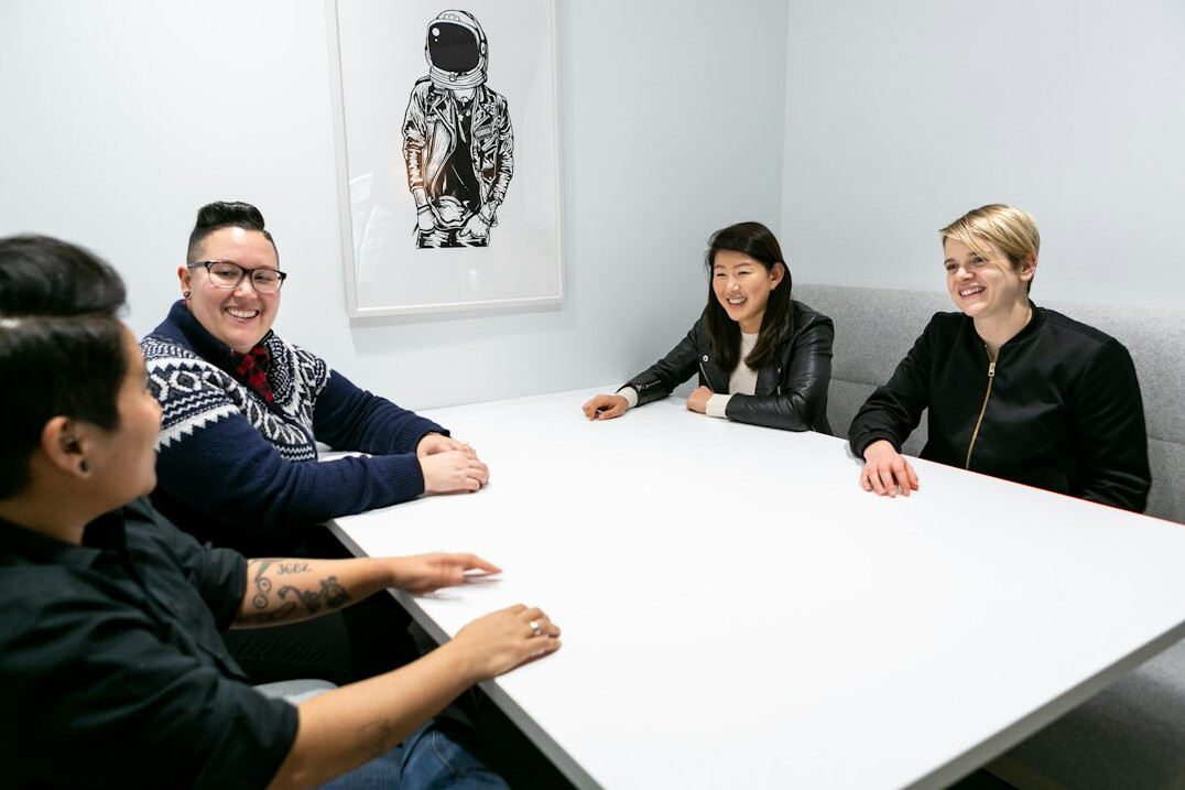 diverse team inspired by leader