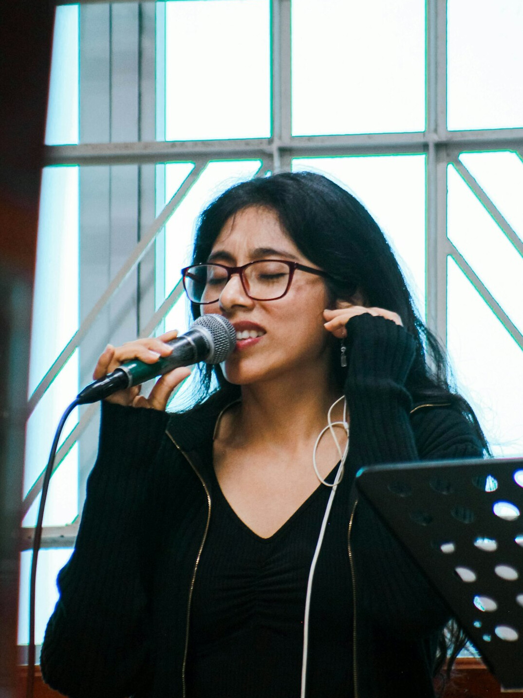 woman practicing voice exercises